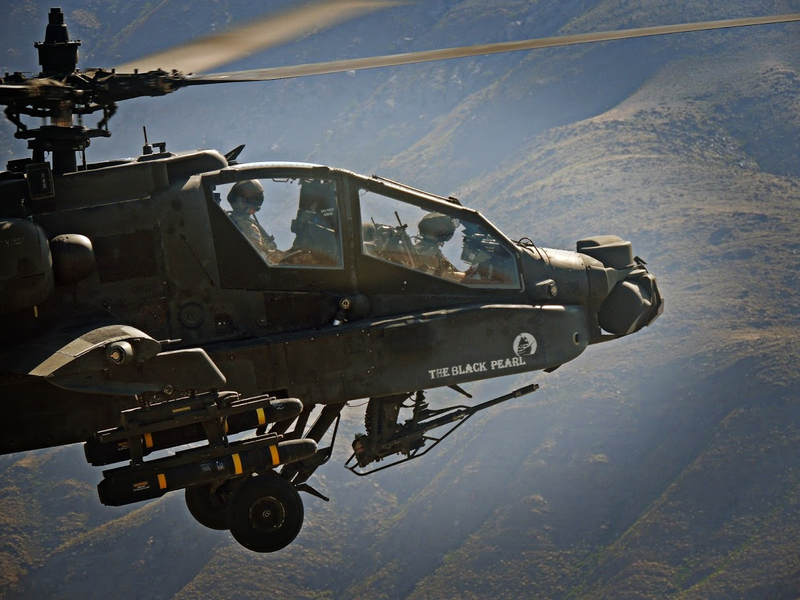 Illustration for article titled One Of Our Readers Is Flying Apaches In Afghanistan And Really Knows How To Use A Camera